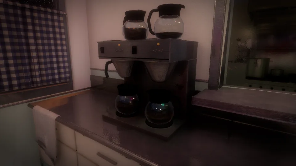 Glass coffee pots on a brewer in the diner